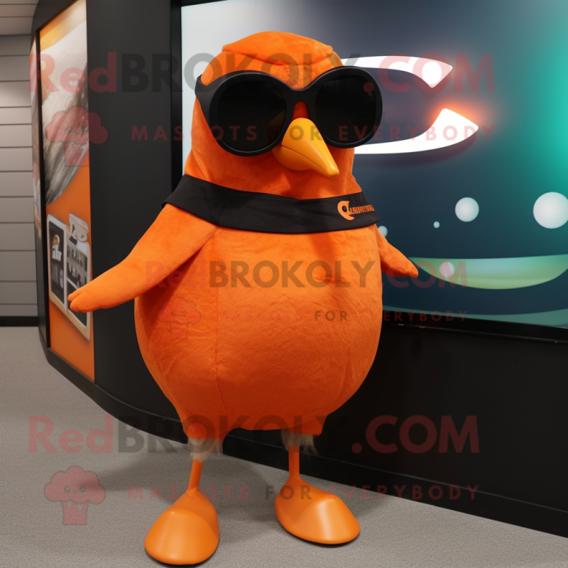 Orange Blackbird mascot costume character dressed with a Tank Top and Sunglasses