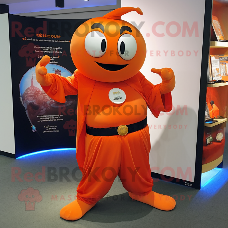 Orange Magician mascot costume character dressed with a Yoga Pants and Keychains