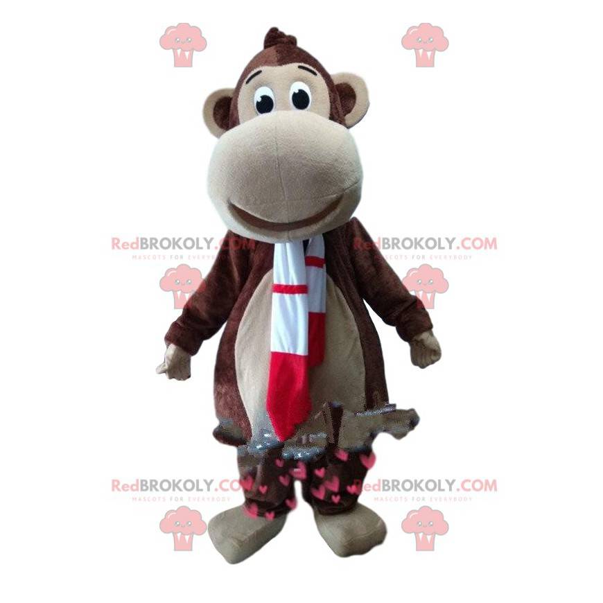Brun abe-maskot med et rødt og hvidt tørklæde - Redbrokoly.com