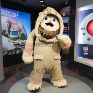 Beige Cyclops mascot costume character dressed with a Parka and Headbands