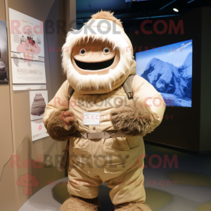 Beige Cyclops mascot costume character dressed with a Parka and Headbands