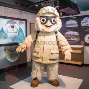 Beige Cyclops mascot costume character dressed with a Parka and Headbands