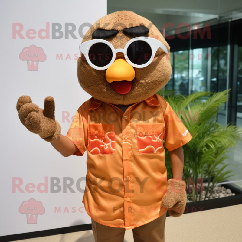 Brown Mandarin mascot costume character dressed with a Button-Up Shirt and Sunglasses Brown Mandarin mascot costume character dressed with a Button-Up Shirt and Sunglasses