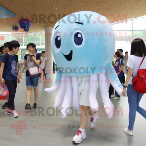 White Jellyfish mascot costume character dressed with a Denim Shorts and Keychains