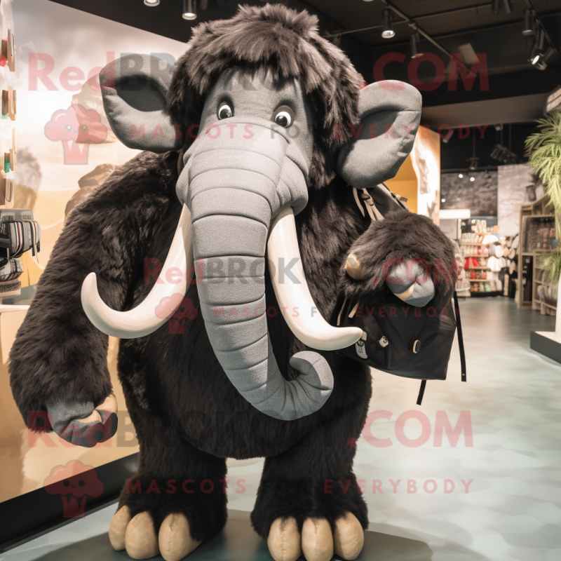 Black Mammoth mascot costume character dressed with a Playsuit and Backpacks Black Mammoth mascot costume character dressed with a Playsuit and Backpacks