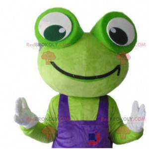 Maskotka zielona żaba z fioletowymi kombinezonami -