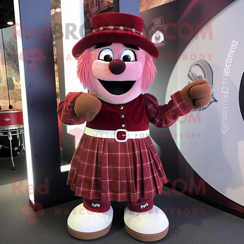 Maroon Bagpipe mascot costume character dressed with a Circle Skirt and Headbands Maroon Bagpipe mascot costume character dressed with a Circle Skirt and Headbands