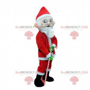 Kerstman mascotte met een snoepgoed van gerst - Redbrokoly.com