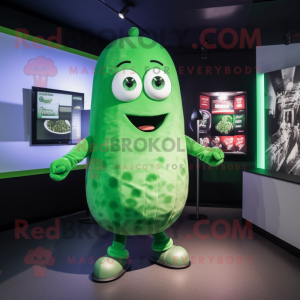 Green Cucumber mascot costume character dressed with a Graphic Tee and Cufflinks