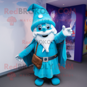 Turquoise Wizard mascot costume character dressed with a Dungarees and Gloves