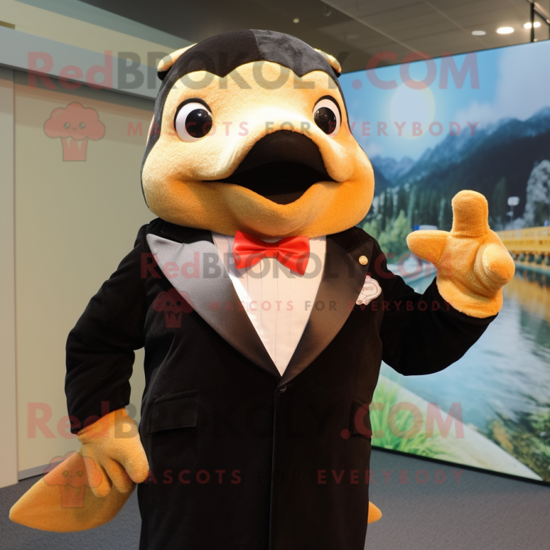 Gold Salmon mascot costume character dressed with a Tuxedo and Mittens