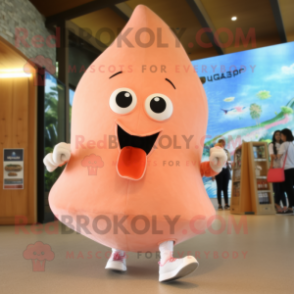 Peach Stingray mascot costume character dressed with a Shorts and Shoe clips