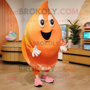 Peach Stingray mascot costume character dressed with a Shorts and Shoe clips