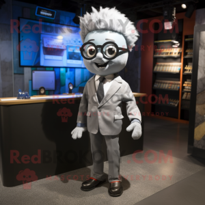 Silver But mascot costume character dressed with a Suit Jacket and Eyeglasses