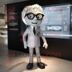 Silver But mascot costume character dressed with a Suit Jacket and Eyeglasses