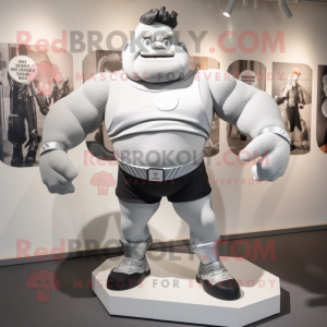 Silver Strongman mascot costume character dressed with a Running Shorts and Wraps