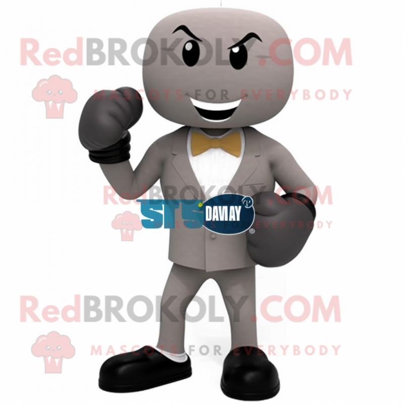 Gray Boxing Glove mascot costume character dressed with a Dress Pants and Bow ties