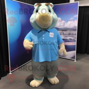 Sky Blue Capybara mascot costume character dressed with a Poplin Shirt and Headbands