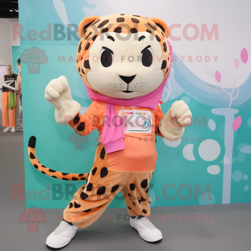 Peach Leopard mascot costume character dressed with a Joggers and Scarves