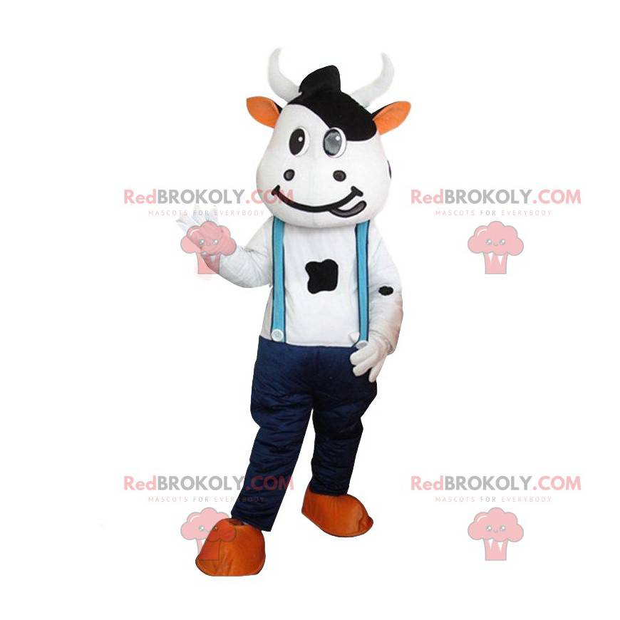 Mascotte della mucca con jeans e bretelle. Pelle bovina gigante