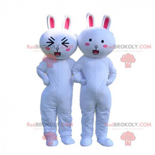 2 mascots of white and pink rabbits, rabbit costumes -