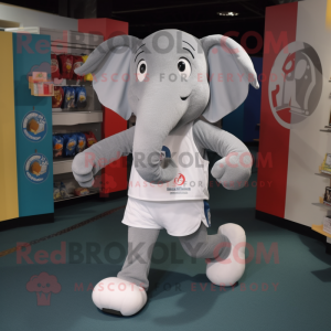 Gray Elephant mascot costume character dressed with a Running Shorts and Coin purses