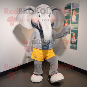 Gray Elephant mascot costume character dressed with a Running Shorts and Coin purses