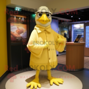 Lemon Yellow Albatross mascot costume character dressed with a Culottes and Scarf clips