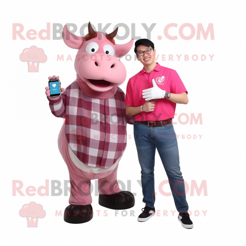 Pink Zebu mascot costume character dressed with a Flannel Shirt and Smartwatches