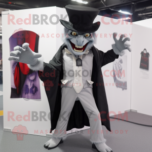 Gray Vampire mascot costume character dressed with a Trousers and Hat pins