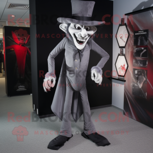 Gray Vampire mascot costume character dressed with a Trousers and Hat pins