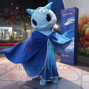 Blue Manta Ray mascot costume character dressed with a Wrap Skirt and Shawls