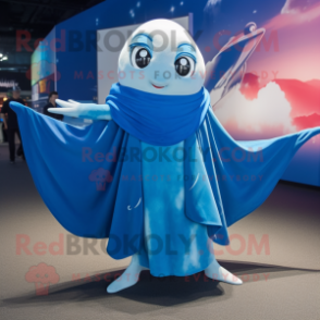 Blue Manta Ray mascot costume character dressed with a Wrap Skirt and Shawls