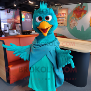 Teal Tandoori Chicken mascot costume character dressed with a Mom Jeans and Shawl pins