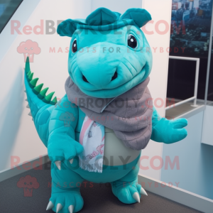 Turquoise Ankylosaurus mascot costume character dressed with a Chinos and Scarf clips