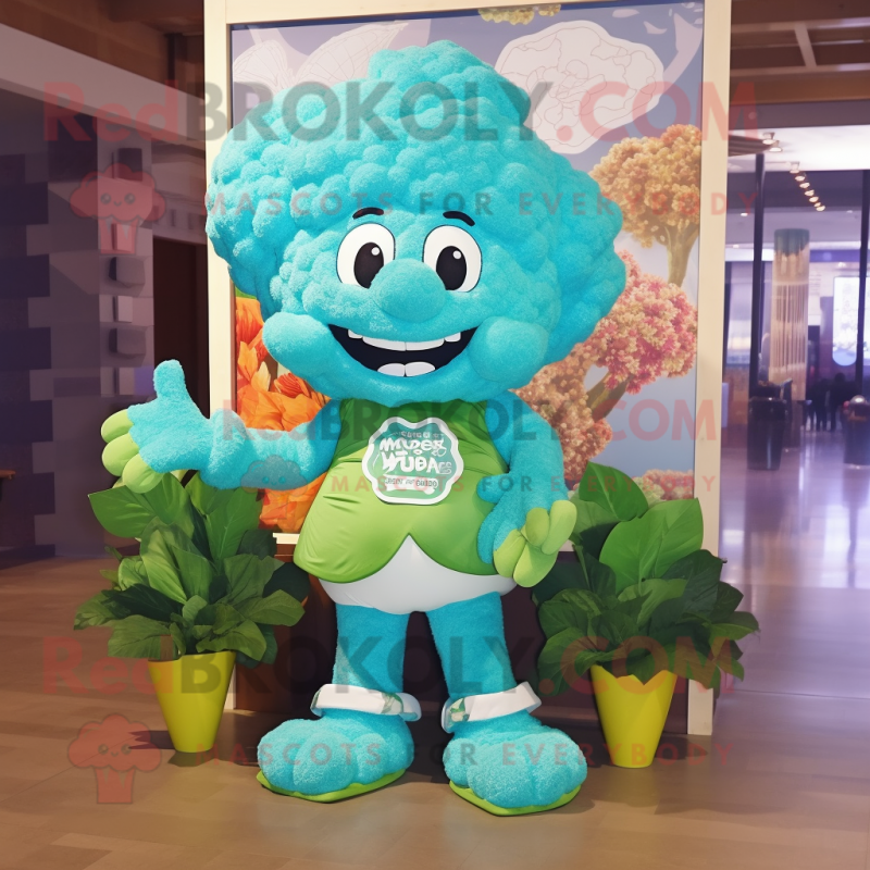 Turquoise Cauliflower mascot costume character dressed with a Graphic Tee and Bow ties