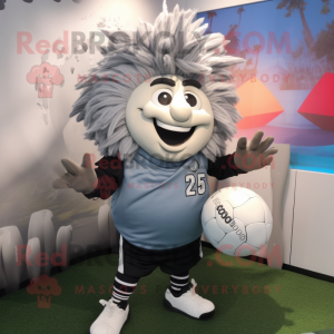 Gray Rugby Ball mascot costume character dressed with a Windbreaker and Hairpins