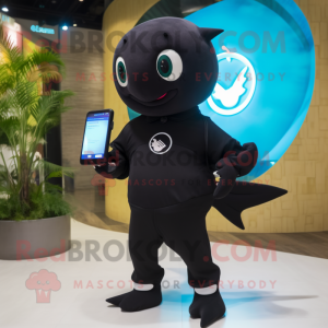 Black Stingray mascot costume character dressed with a Polo Tee and Smartwatches