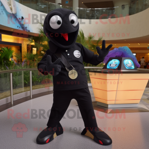 Black Stingray mascot costume character dressed with a Polo Tee and Smartwatches