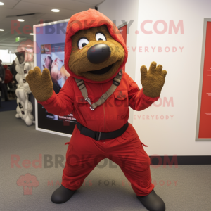 Red Special Air Service mascot costume character dressed with a Joggers and Mittens