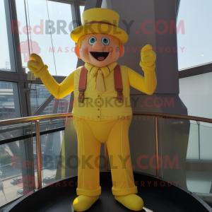 Yellow Trapeze Artist mascot costume character dressed with a Waistcoat and Hats