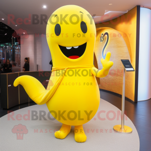 Yellow Whale mascot costume character dressed with a Sheath Dress and Bracelets