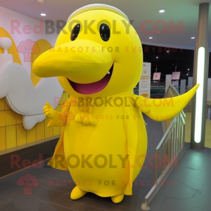 Yellow Whale mascot costume character dressed with a Sheath Dress and Bracelets