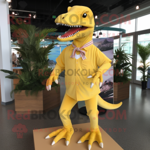 Yellow Tyrannosaurus mascot costume character dressed with a Bermuda Shorts and Hat pins