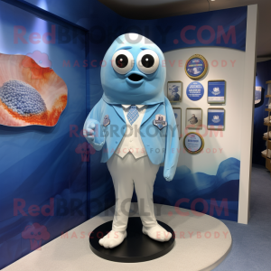 Blue Oyster mascot costume character dressed with a Swimwear and Lapel pins