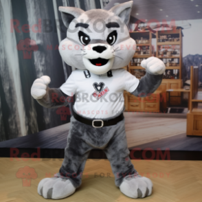 Silver Bobcat mascot costume character dressed with a T-Shirt and Cummerbunds