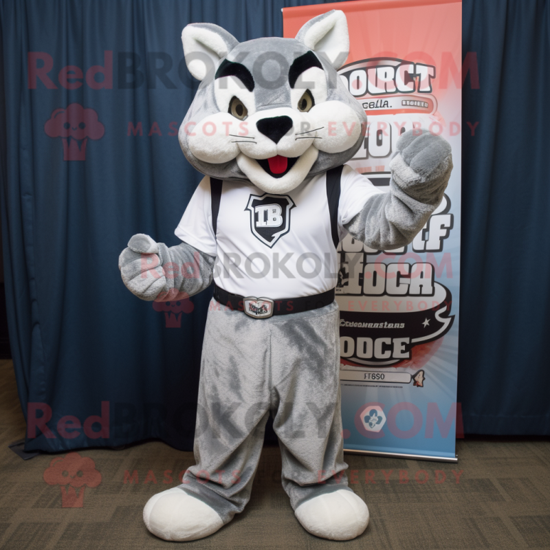 Silver Bobcat mascot costume character dressed with a T-Shirt and Cummerbunds Silver Bobcat mascot costume character dressed with a T-Shirt and Cummerbunds