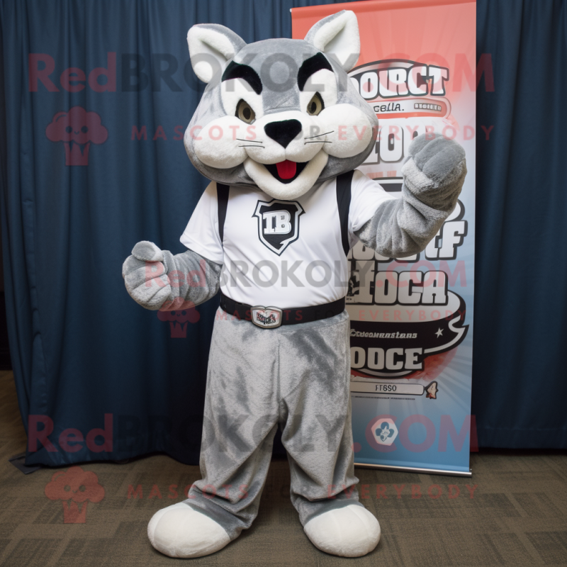 Silver Bobcat mascot costume character dressed with a T-Shirt and Cummerbunds