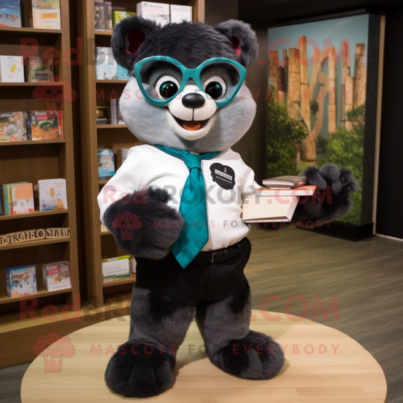 Teal Spectacled Bear mascot costume character dressed with a Romper and Pocket squares Teal Spectacled Bear mascot costume character dressed with a Romper and Pocket squares