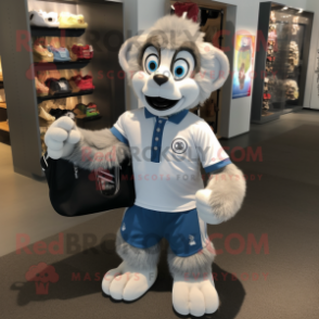 Silver Monkey mascot costume character dressed with a Rugby Shirt and Tote bags